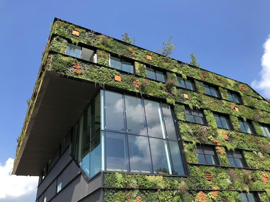 Office building with plants on every balcony